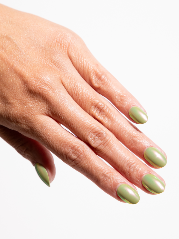 A set of Chill Tips in Patina Party, featuring stylish press-on nails with a unique patina-inspired design. The nails have a mix of earthy tones and a metallic finish, offering a trendy, eye-catching look for a chic and effortless manicure.