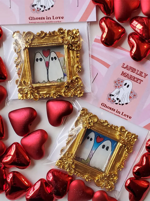 Hand-painted mystery mini art piece of little ghosts in love – a cute and romantic collectible for spooky season or quirky decor lovers.