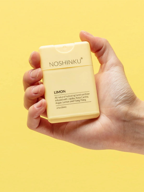 Lemon pocket hand sanitizer with a zesty, fresh scent, packaged in a compact bottle perfect for on-the-go cleaning and a burst of citrus freshness