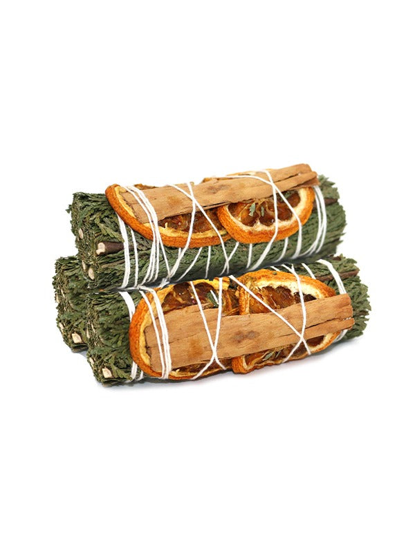 A 4-inch smudge stick made from cedar sage, infused with the warm, spicy scents of orange and cinnamon. The bundle is tightly wrapped with natural twine, offering a unique aromatic blend perfect for cleansing and creating a calming, comforting atmosphere.