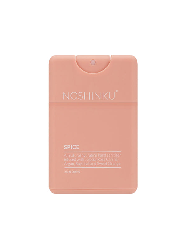 Pocket sanitizer in a refreshing orange and coriander scent, featuring a compact bottle that's perfect for on-the-go cleansing and a burst of fresh fragrance.