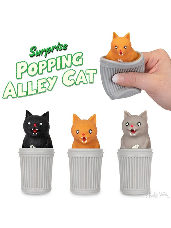 An assortment of surprise popping alley cat toys, each featuring a playful, quirky cat design that pops open to reveal a fun surprise inside.