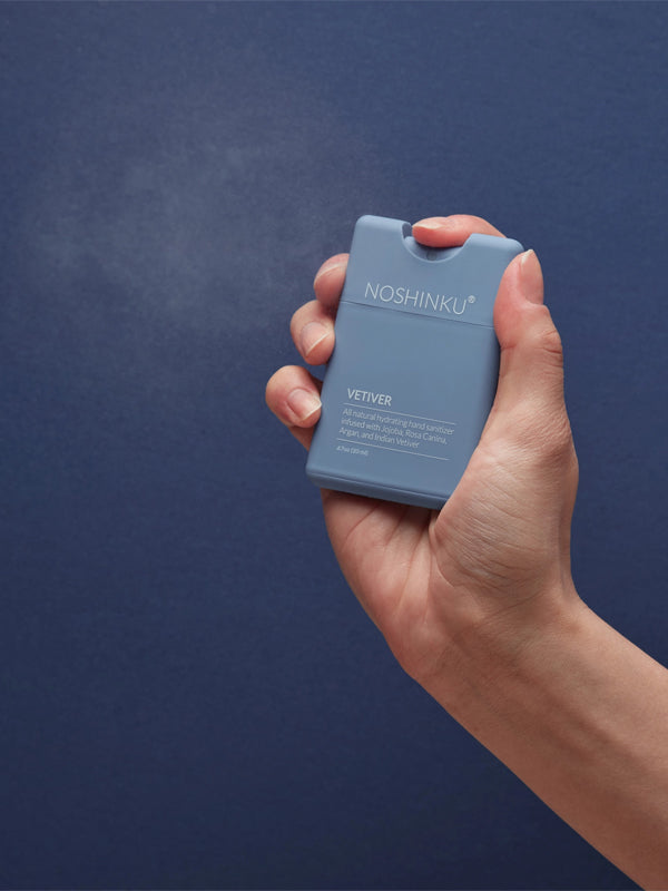 Vetiver pocket hand sanitizer with a refreshing, earthy scent, packaged in a compact bottle perfect for on-the-go cleaning and a touch of nature-inspired fragrance.