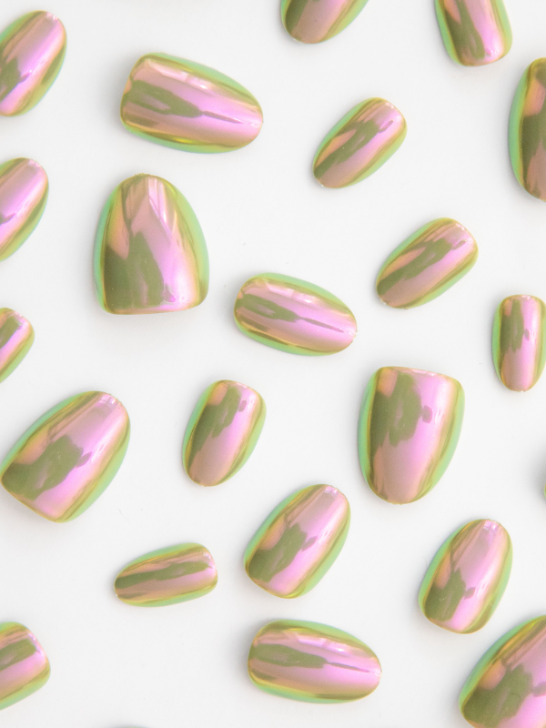 A set of Chill Tips in Patina Party, featuring stylish press-on nails with a unique patina-inspired design. The nails have a mix of earthy tones and a metallic finish, offering a trendy, eye-catching look for a chic and effortless manicure.