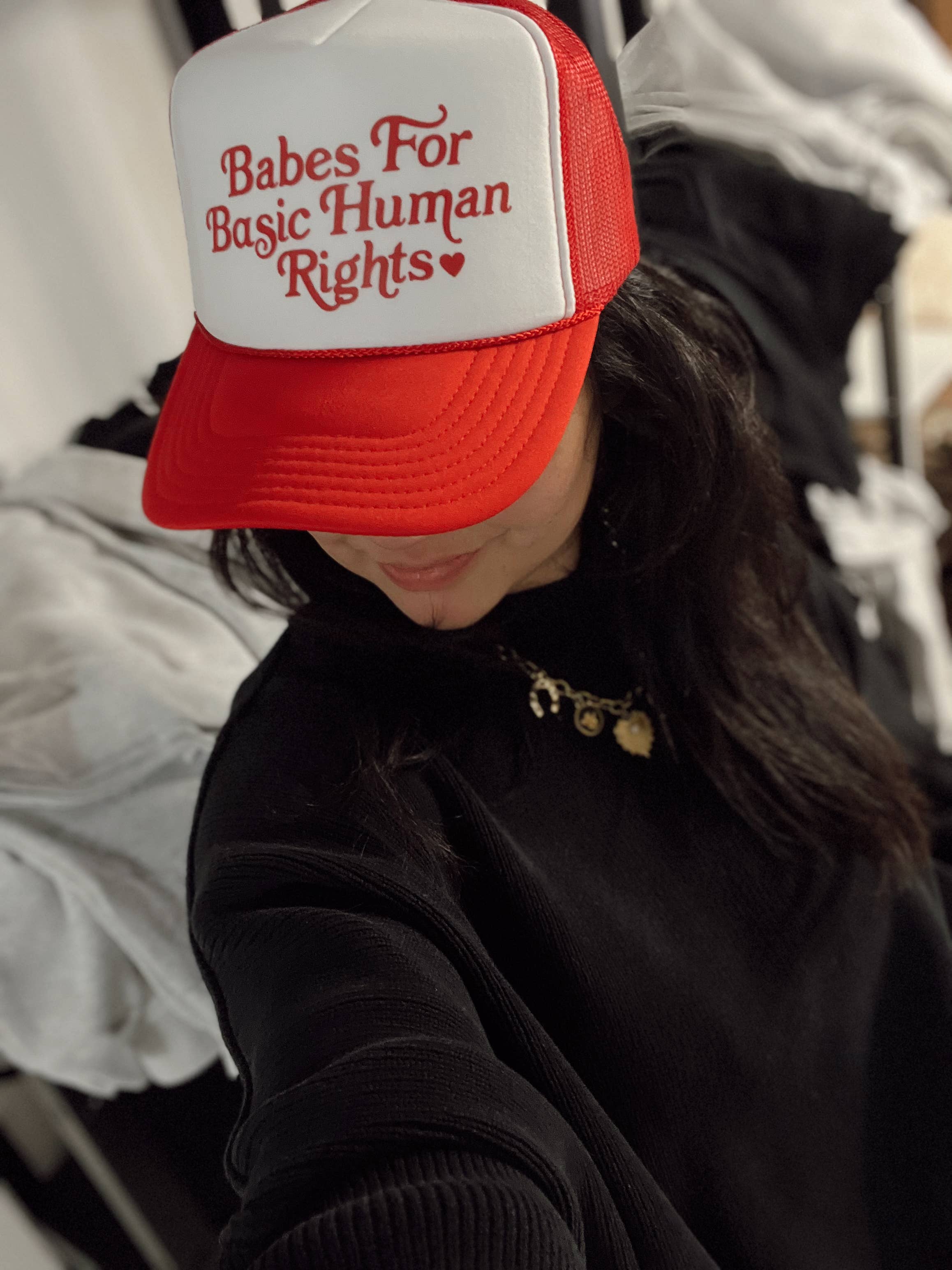 Babes for Basic Human Rights Trucker Hat