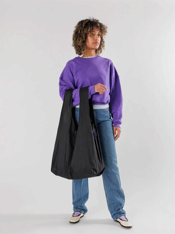 Big Baggu, a spacious and durable tote bag with a simple, versatile design, perfect for carrying larger items or used as an eco-friendly shopping bag.
