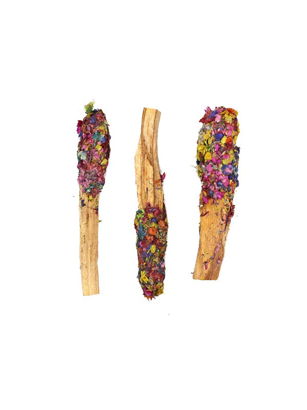 Close-up of Dipped Chakra Harmony Palo Santo Pops, featuring natural wood sticks coated with colorful chakra-inspired resins, designed for spiritual cleansing and relaxation.
