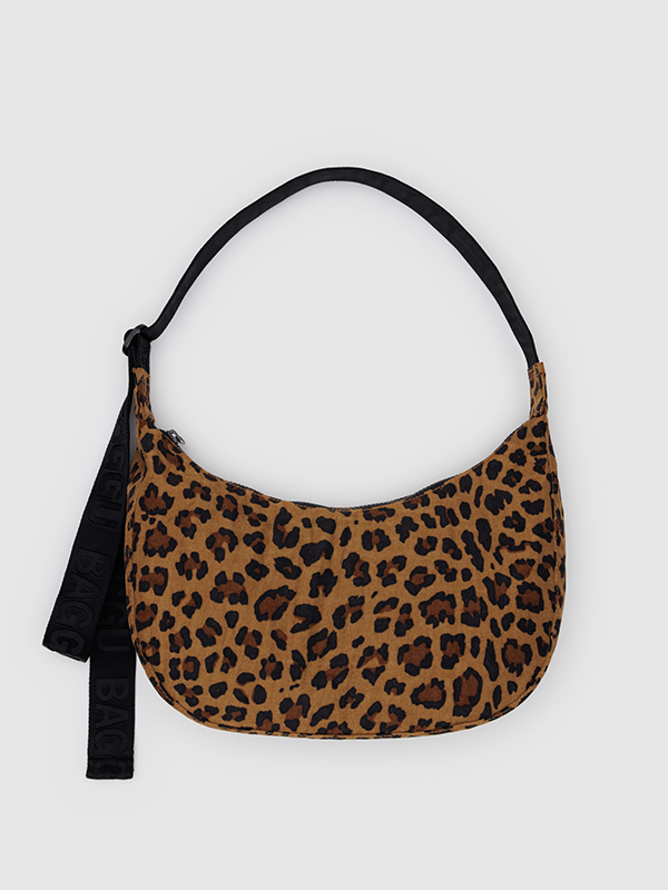 Medium Crescent Baggu, a sleek and stylish bag with a curved shape, offering a perfect balance of size and functionality for everyday use.