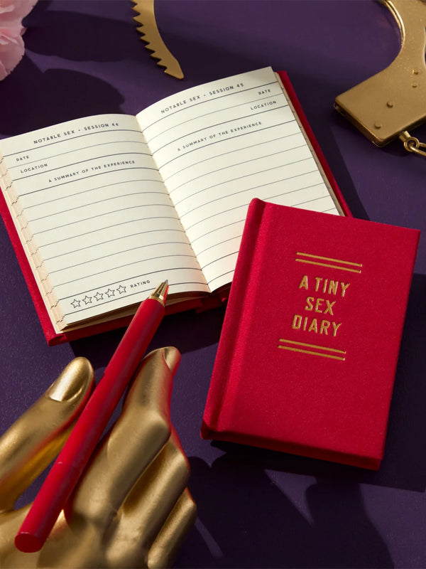 Tiny Sex Diary featuring a compact, playful design with prompts for jotting down intimate thoughts and experiences, perfect for personal reflection or fun keepsakes.