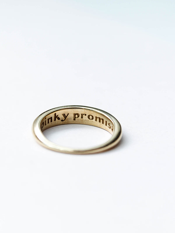 Pinky promise ring, gold-plated with a delicate design, symbolizing trust and commitment, perfect for a meaningful and stylish gesture.