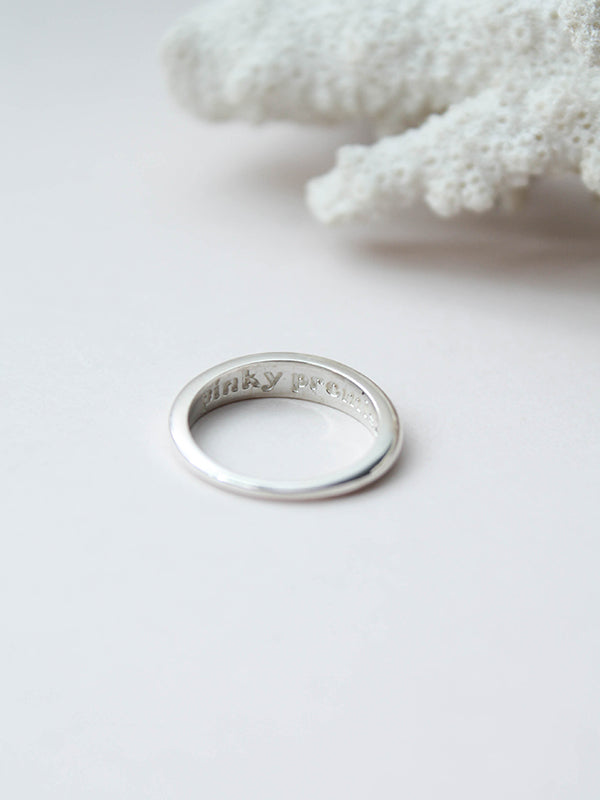 Pinky promise ring featuring a delicate design, symbolizing a bond of trust and commitment, perfect for a sweet and meaningful gesture.